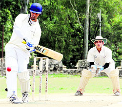 A batsman in action in a match during the 60th Dehradun District Cricket League Tournament in Dehradun on Friday