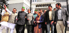 Congress MLAs outside the Vidhan Sabha in Shimla after staging a walkout from the House on Friday.