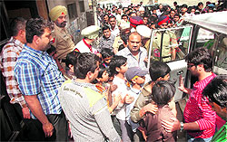 Administration and police officials with the rescued children in Ludhiana on Friday
