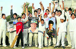 Budding cricketers in a jubilant mood after Sachin Tendulkar scored 100th international century, in Ludhiana on Friday