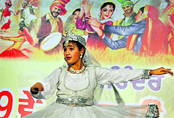 A girl performs a dance at the 9th Mahinder Singh Dangori Memorial Folk Dance competition in Ludhiana on Friday