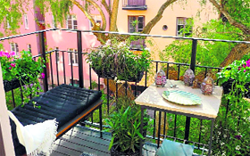 A touch of green in the balcony helps in the flow of positive energy