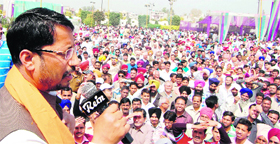 Anil Joshi addresses people in Amritsar on Saturday.