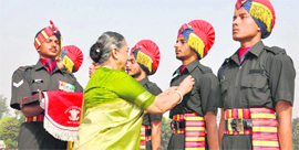 Governor Margaret Alva presents medals to the winners during the passing-out parade at Bengal Engineering Group and Centre at Roorkee on Saturday.