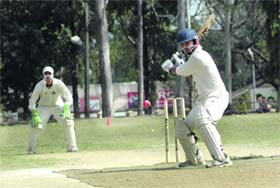 A batsman in action in a match during the 60th Dehradun District Cricket League Tournament in Dehradun on Saturday