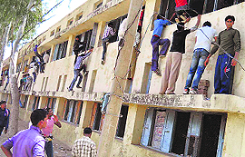 An outside view of an examination centre of the Haryana Board at Bhiwani on Saturday. 