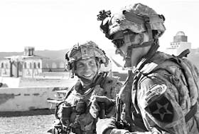 File photo of Staff Sgt Robert Bales (L) at the National Training Centre in Fort Irwin, California