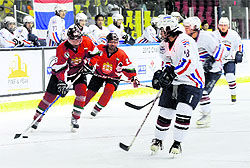 Players of Thailand (in white) and the United Arab Emirates team in action during the IIHF Challenge Cup of Asia in Dehradun on Sunday