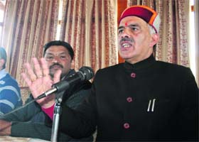 BJP spokesman Ganesh Dutt addresses mediapersons in Shimla on Sunday