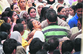 The grief-stricken Shashi Kumari, mother of Sahil Mehra who drowned in the Tawi on Saturday. 