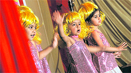 Children perform a dance during the annual function of Maple Bear Canadian Playway and Nursery School in Ludhiana.