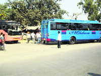 Passengers board buses outside the Jagraon bus stand.