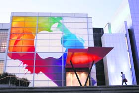 In this file photo, an Apple logo is seen at the entrance of Yerba Buena Centre for Arts in San Francisco