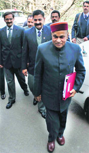 Chief Minister PK Dhumal on way to the HP Vidhan Sabha to present the Budget 2012-13 in Shimla on Monday.