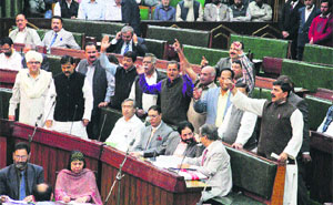 Opposition members protest in the Assembly in Jammu on Monday. 