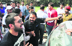 Former Youth Congress leader Narinder Makkar argues with students in Ludhiana on Monday. Tribune photo: Himanshu Mahajan