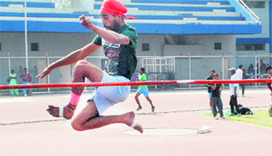 An athlete in action at the Punjab State Industrial Trainees Inter-Zonal Athletics Meet at Guru Nanak Stadium in Ludhiana on Monday.