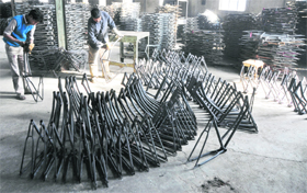 Workers assemble cycle parts in one of the cycle units in Ludhiana. 