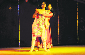 Girls perform a dance during a farewell party of the Department of Fine Art at the Government College for Women in Ludhiana.