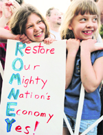 Children listen to Republican presidential candidate Mitt Romney in Illinois