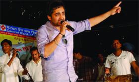 Punjabi singer Sherry Mann performs during the Mechactaeon-2012, a function organised at the PTUs Giani Zail Singh campus in Bathinda on Monday evening.