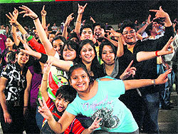 Fans in a jubilant mood during the World Series Hockey match between Chandigarh Comets and Delhi Wizards at the Sector-42 stadium in Chandigarh on Tuesday