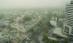 A blanket of dust covers Connaught Place in New Delhi
