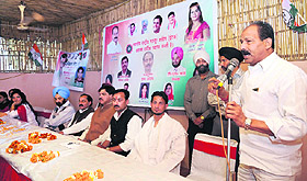 Dinesh Sundriyal, state president of the INTUC, at a meeting in Dehradun on Tuesday.