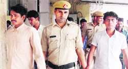 Workers arrested for damaging property and torching vehicles in police custody at Gurgaon