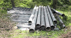 Pipes meant for the Kangra sewerage scheme rot away on the bypass.