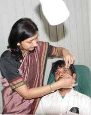 Dr Shveta Grover examines the patient Hari Singh at her hospital in Bathinda on Wednesday. 