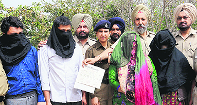Members of the fake certificate gang in police custody in Chandigarh on Wednesday.