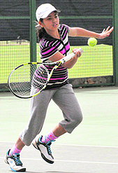 Janhavi in action during the Chandigarh Club Open Tennis Tournament at Chandigarh Club, Sector 1, Chandigarh, on Wednesday.