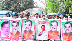 Congress activists hold a march in Haridwar on Wednesday urging Congress president Sonia Gandhi to make Rudraparayag MLA 