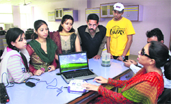 Deepika Sood, resources person of the programme, talks to the trainees during the workshop held in Jalandhar