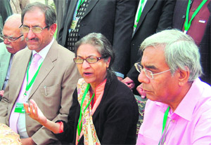 Pakistani human rights activist Asma Jehangir (C) addresses mediapersons in Amritsar on Wednesday.