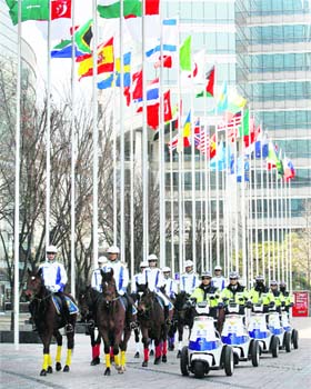 South Korean police officers patrol near the venue of the Nuclear Security Summit in Seoul
