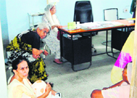 Patients wait for a doctor at the Civil Hospital in Amritsar