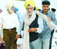 Dr Dharmbir Singh Jolly, Rector of Khalsa College Governing Council (KCGC) after being honoured by the council at the gurdwara in Amritsar