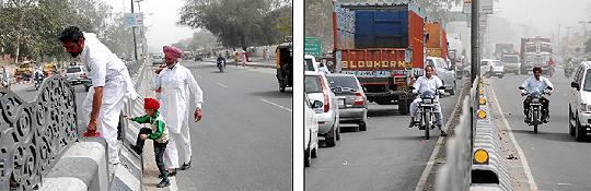 Unmindful of the risk involved, these two men and a kid cross the divider on the Bathinda-Mansa road; a biker flouts the traffic rule by driving on the wrong side.