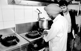 Officials of the Haryana Pollution Control Board seal a burner in a hotel in Panchkula on Thursday.