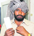 An injured Punjab Police commando after a bee attack at Sector 9, Chandigarh, at the government hospital, Sector 16, on Thursday.