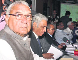 Chief Minister Bhupinder Singh Hooda at the 32nd meeting of the NCR Board in Delhi on Thursday. 