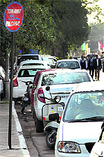 The signboard of tow-away zone does not deter owners from parking their vehicles near Circuit House in Jalandhar