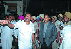 DC KK Yadav and the NDRF commandant take stock of the situation