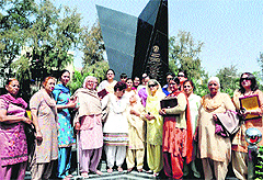 The awardees with city Mayor Raj Bala Malik on the martyrdom day of Shaheed Bhagat Singh, Rajguru and Sukhdev at Terraced Garden in Sector 33, Chandigarh, on Friday.