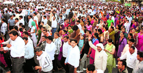 Guest teachers block the Delhi-Rohtak road at Sheela bypass in Rohtak on Friday.