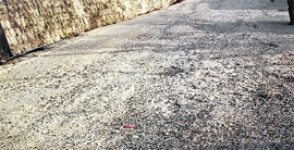 Potholes dot a portion of the Dharamsala-Chambi road. 