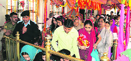 Pilgrims pay obeisance at the Chamunda Devi temple in Kangra on Friday.