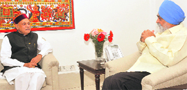 Chief Minister PK Dhumal at a meeting with Planning Commission Deputy Chairman Montek Singh Ahluwalia to finalise the Annual Plan for the state in New Delhi on Friday.